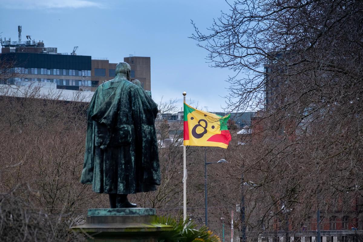 Larry Achiampong, Pan African Flag for the Re lic Travellers' Alliance (2021). Installation view at Dr Martin Luther King Jr. building, Liverpool Biennial 2021. Courtesy of the artist and Copperfield, London Photography: Mark McNulty