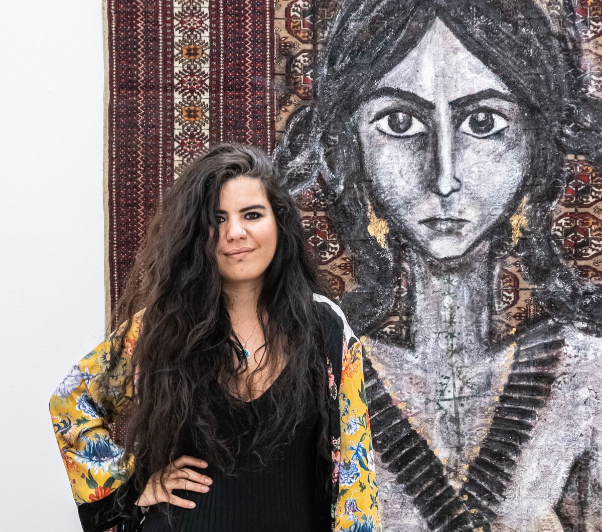 Zehra Dogan at her exhibition Frenetic Standstill in Turin © OKNOstudio