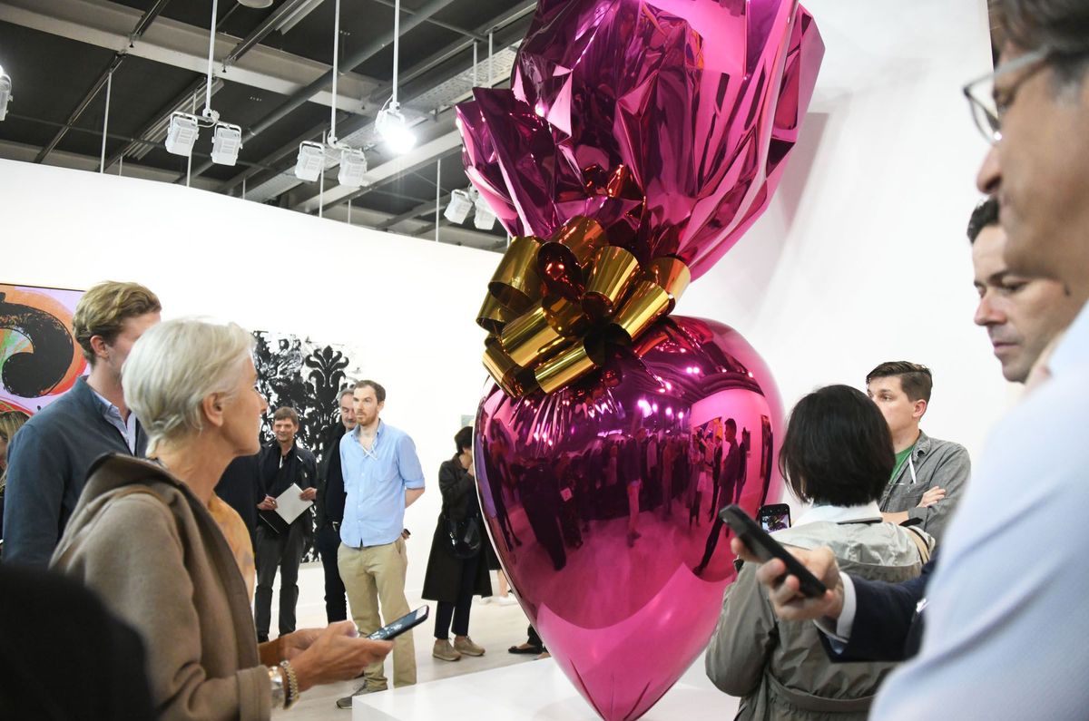A work by Jeff Koons,  Sacred Heart (Magenta/Gold), was on sale at Art Basel with an asking price of $14.5m just after the artist's record-breaking $91m sale at Christie's New York in May. Catherine Kohler/SIPA/Shutterstock