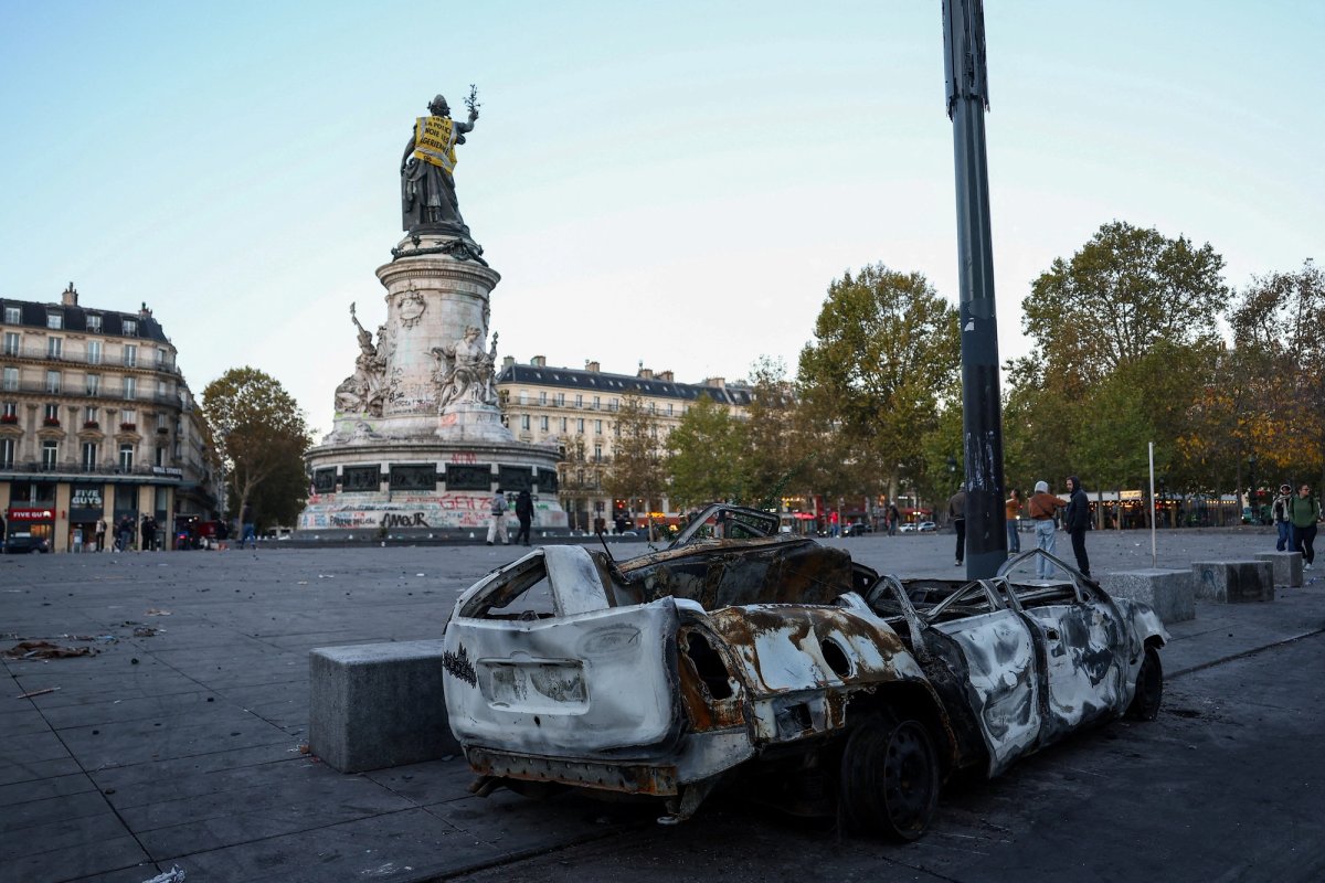 A destroyed car near the Marianne statue at the Place de la Republique, with a yellow vest put on it, the day after clashes during a national day of demonstrations against the cost of living and rising fuel prices, in Paris, France
Photo: REUTERS/Abdul Saboor TPX IMAGES OF THE DAY