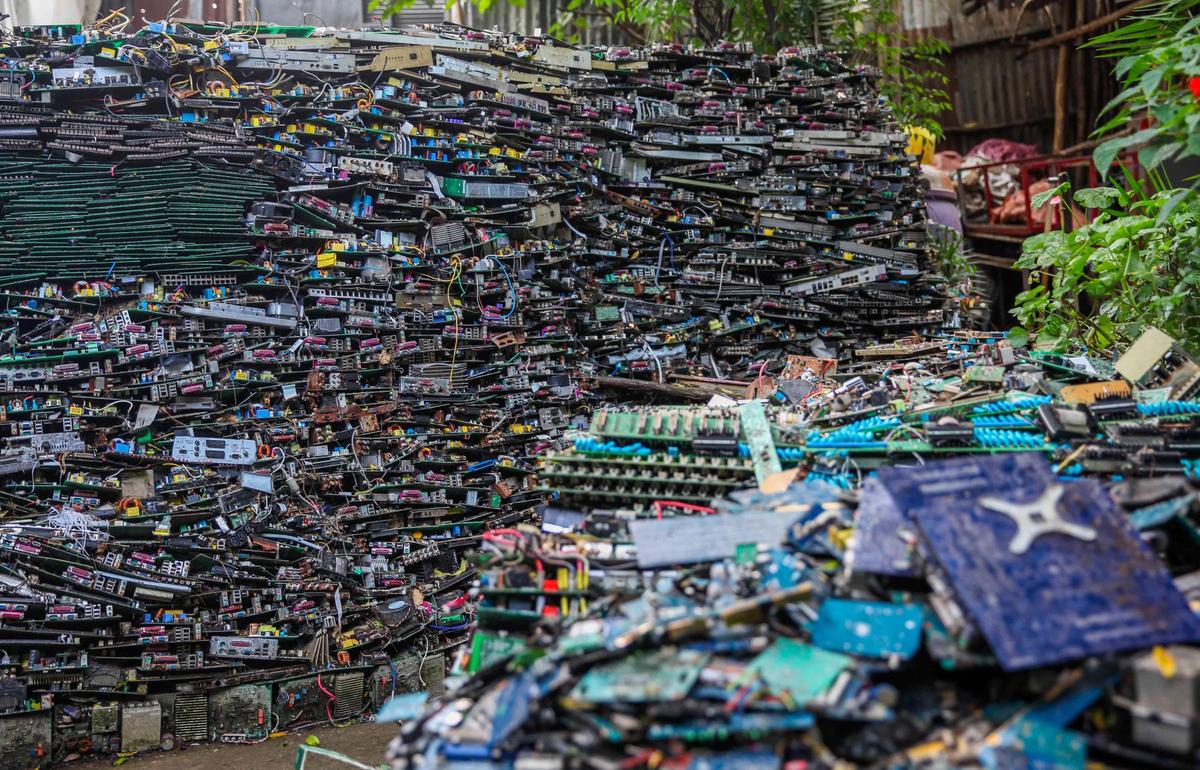 Elias Sime’s studio, with the piles of e-waste that he incorporates into his work Photo: Alice Hendy