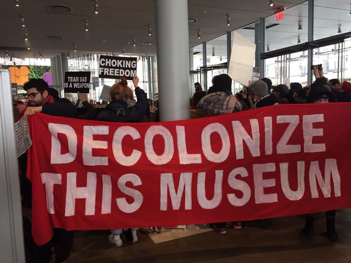 A protest at the Whitney Museum of American Art over Warren B. Kanders's business ties in December 2018 