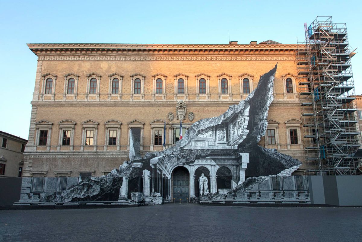 JR's installation disguises scaffolding across the front of the Palazzo which is undergoing a four-year restoration costing €5.6m Courtesy of the French Embassy in Rome