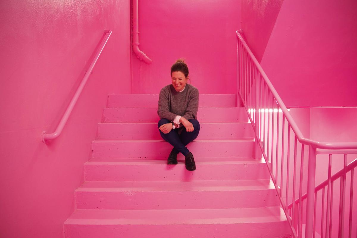 Hannah Barry on Simon Whybray's pink staircase © Holly Whittaker