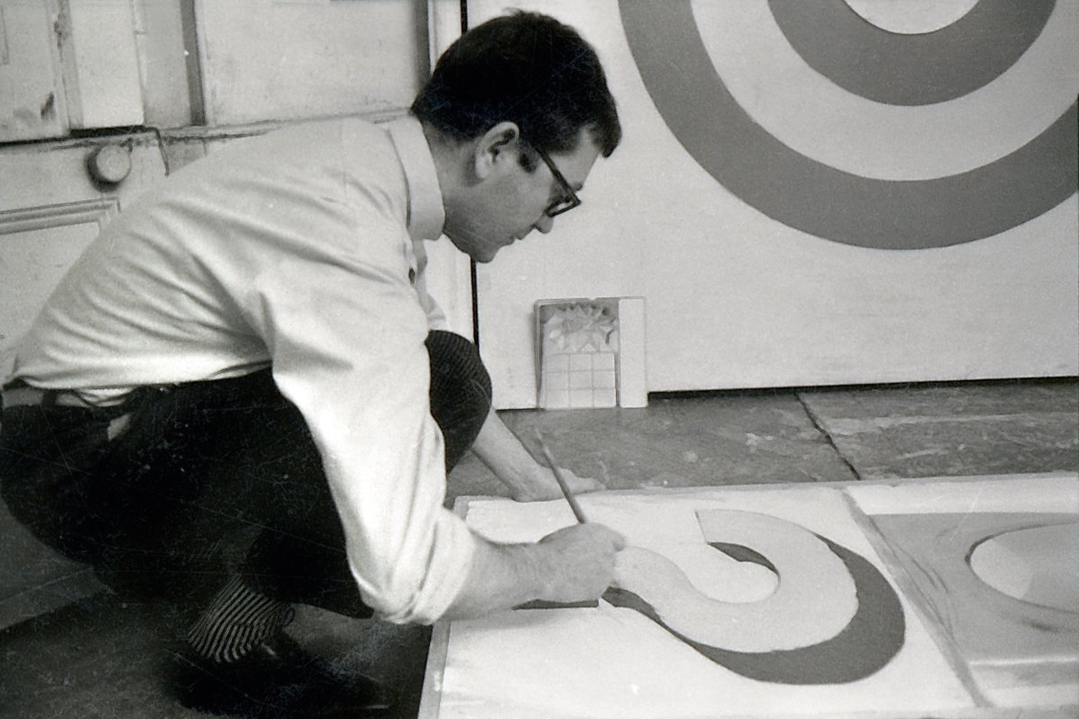 Joe Tilson at his Argyll Road studio in London in the 1960s
© Tilson family archives