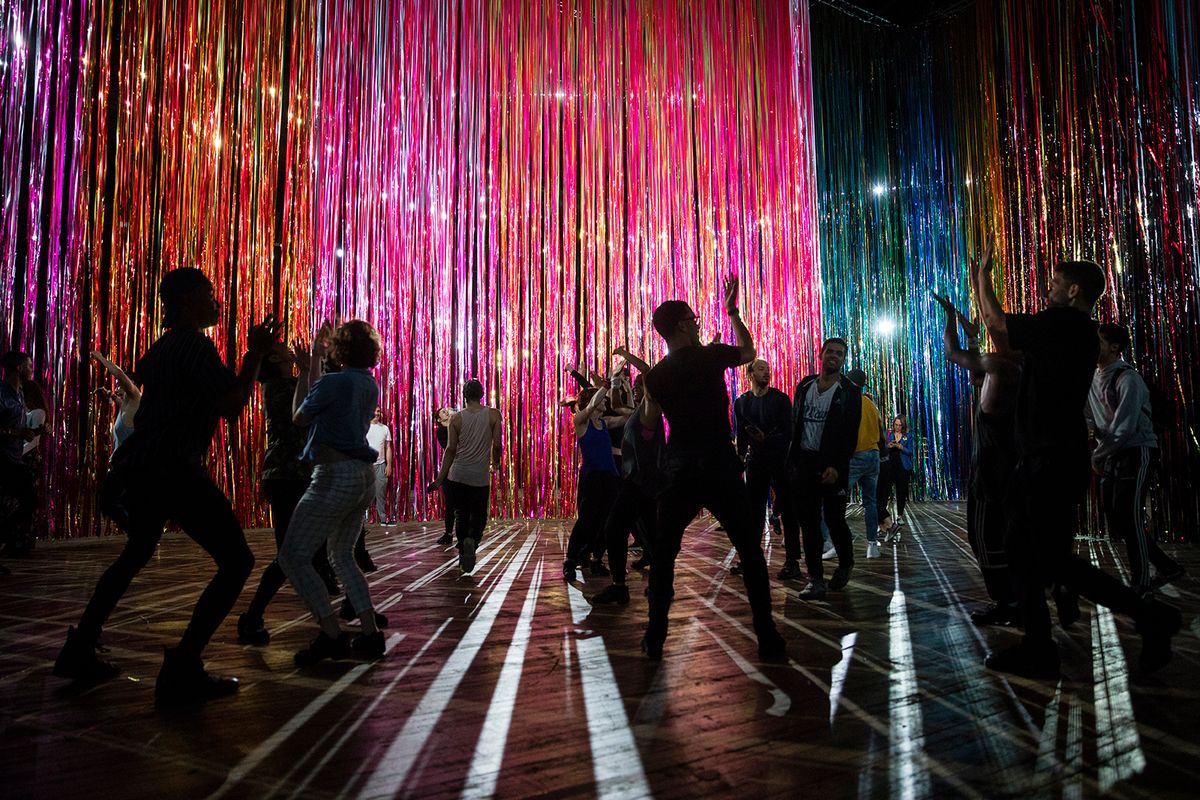 Visitor dance inside Nick Cave's installation The Let Go at the Park Avenue Armory James Ewing