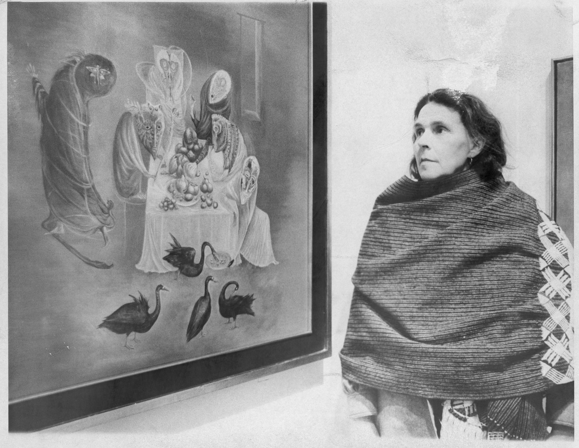 Leonora Carrington in 1975 with her work Lepidoptera (1969) Photo: Jerry Engel/New York Post Archives /© NYP Holdings, Inc. via Getty Images