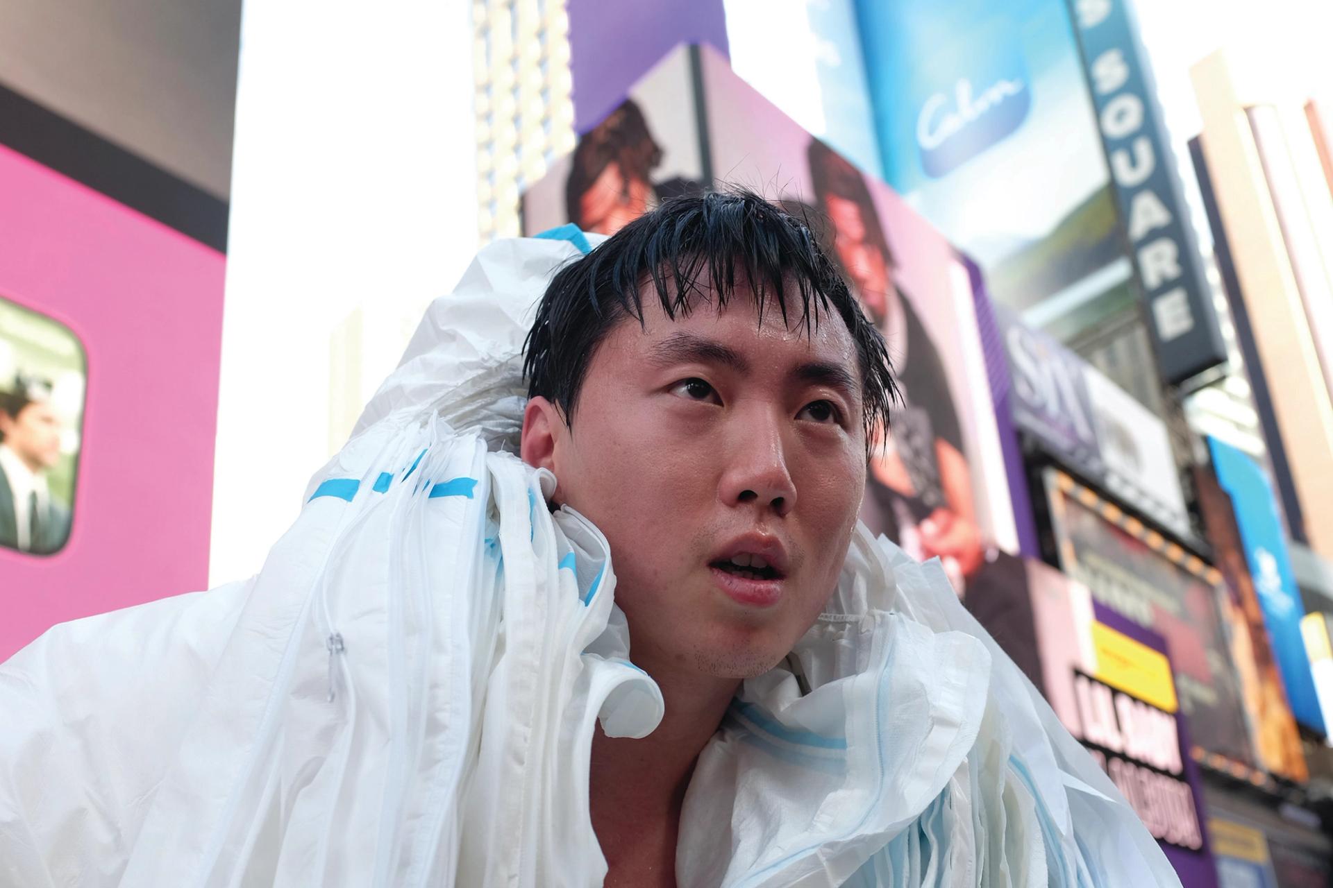 Zhisheng Wu wrapped himself in 27 hazmat suits to highlight China’s pandemic restrictions Courtesy of Zhisheng Wu