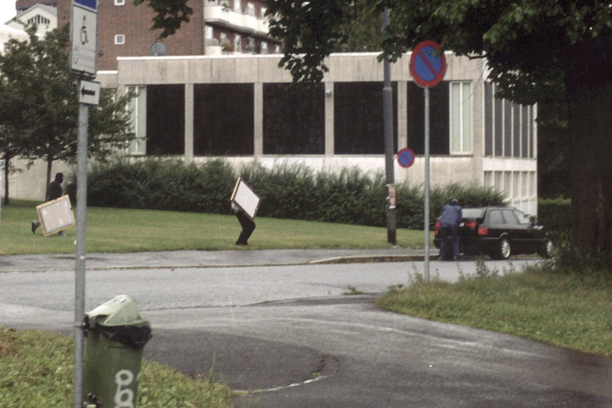 Thieves outside the Munch Museum in Oslo POLICE/AFP via Getty Images