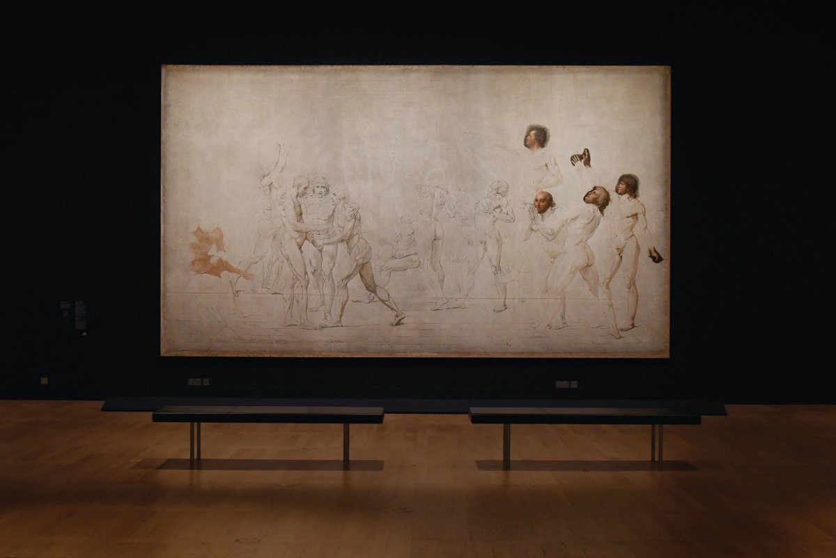 An installation view of Jacques-Louis David’s unfinished The Tennis Court Oath (1791-92), which is on loan from the Château de Versailles Photo: © 2025 Musée du Louvre/Audrey Viger