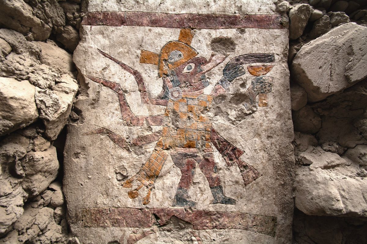 Moche figure with human body and spider features carrying a goblet, painted on a pillar within the Hall of the Moche Imaginary Photograph by Lisa Trever