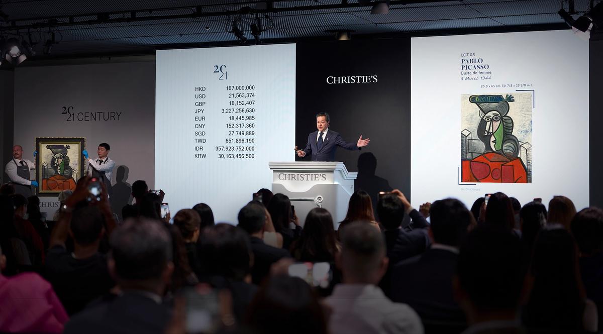 Picasso's 1944 painting Buste de Femme set his Asia record price at Christie's Hong Kong, hammering for HK$196.75m (US$25.4m)