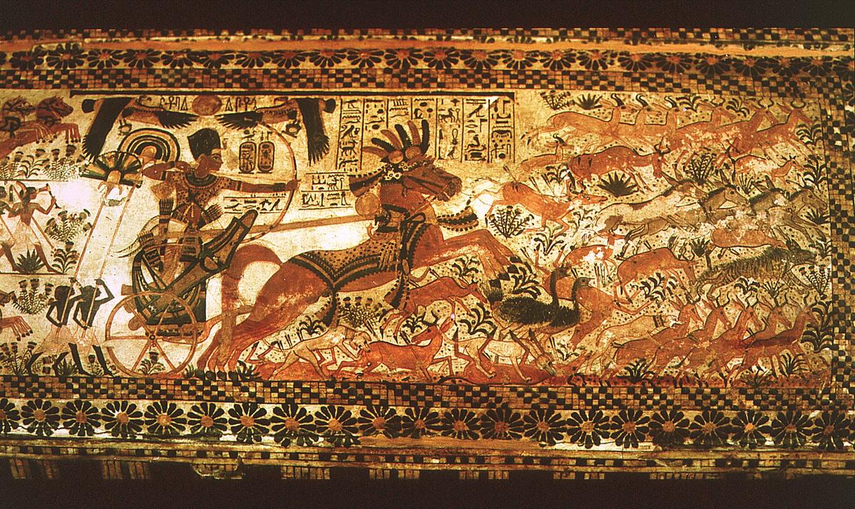 Tutankhamun hunting while riding on his chariot, painted on the lid of one of the chests found in his tomb Heritage Image Partnership Ltd / Alamy Stock Photo