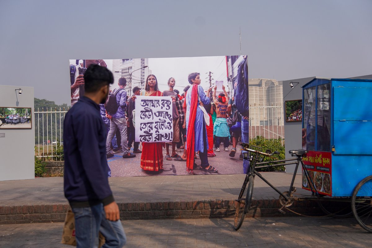 Taking it to the streets: life-sized photographs of protest on the sidewalk during the Chobi Mela photography festival MH Akash/Drik