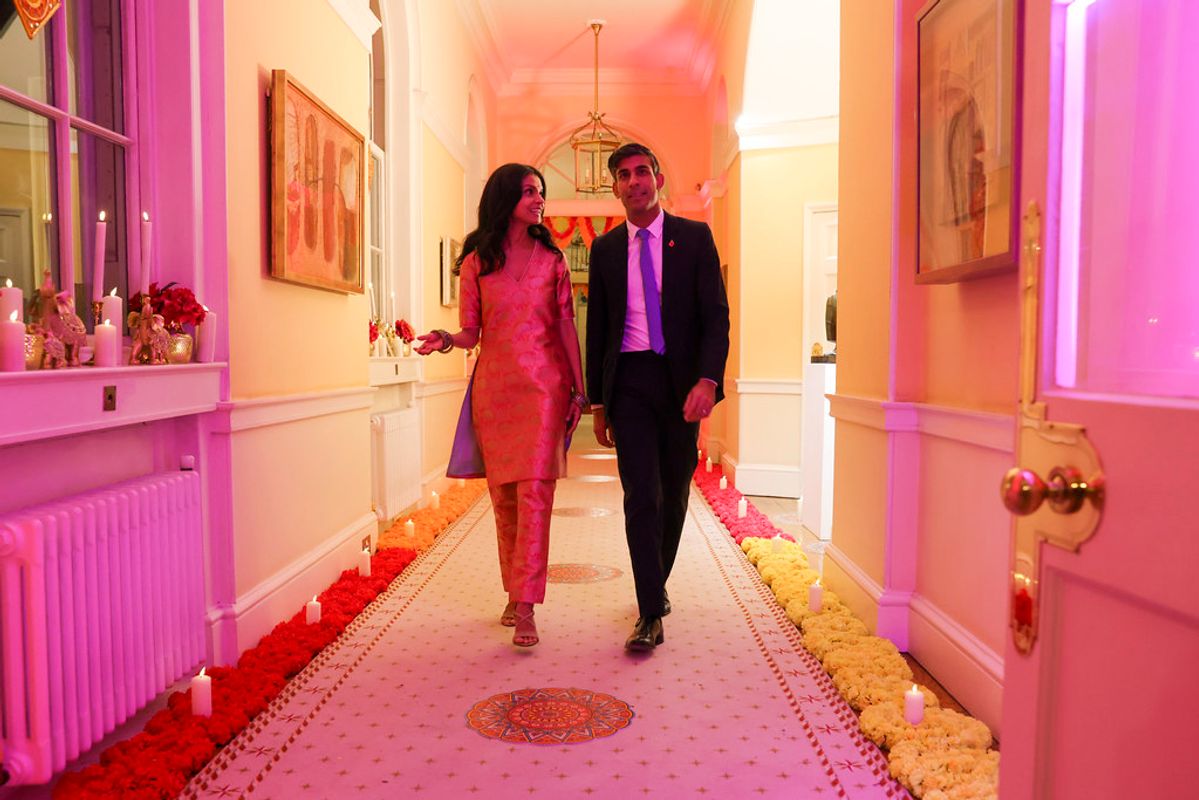 UK prime minister Rishi Sunak and his wife Akshata Murty wander the corridor surrounded by works from Newcastle's Laing Art Gallery

Photo: Crown