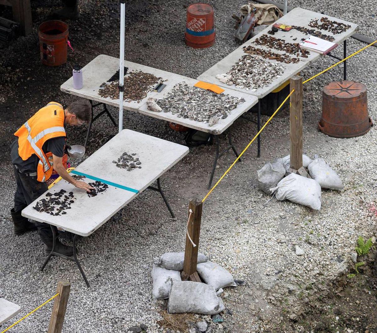 A worker at an archaeological dig in the Brickell neighbourhood. Millions of artefacts have been found at the sites of two property developments there © Matias J. Ocner/Miami Herald via ZUMA Press Wire/Alamy Stock Photo