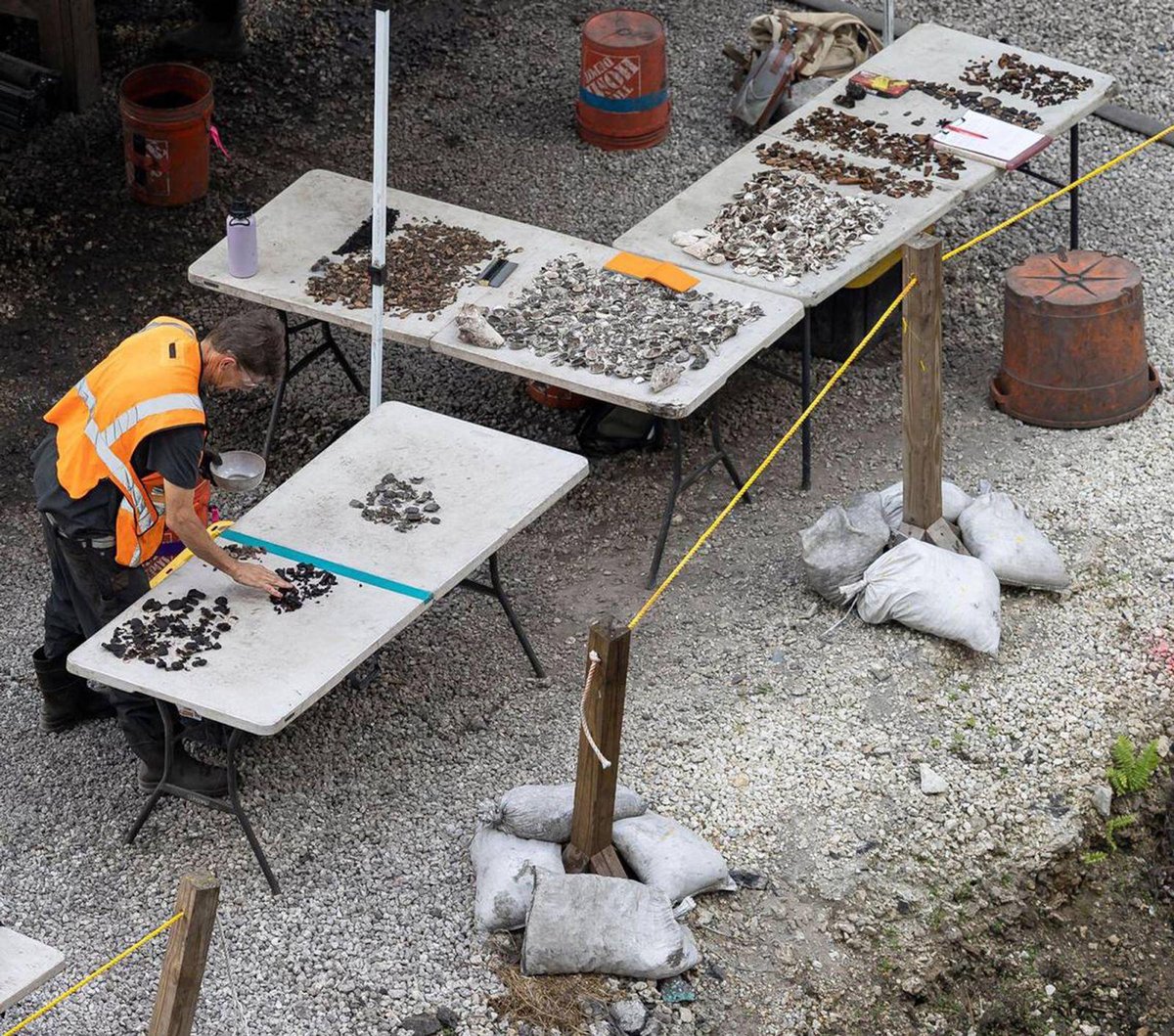 A worker at an archaeological dig in the Brickell neighbourhood. Millions of artefacts have been found at the sites of two property developments there © Matias J. Ocner/Miami Herald via ZUMA Press Wire/Alamy Stock Photo