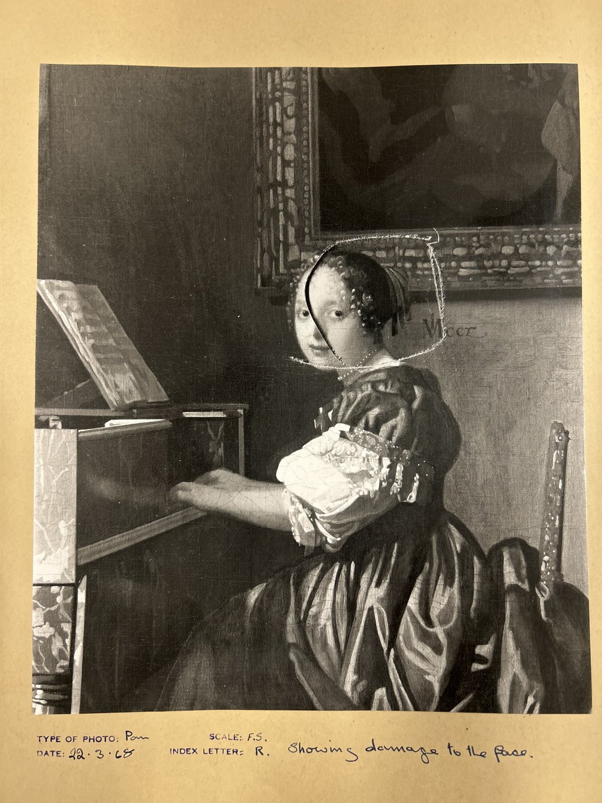 In 1968 Vermeer’s Young Woman Seated at a Virginal was severely damaged after it was slashed by a vandal. At the time, the trustees decided against allowing publication of this photograph of the damage National Gallery, London