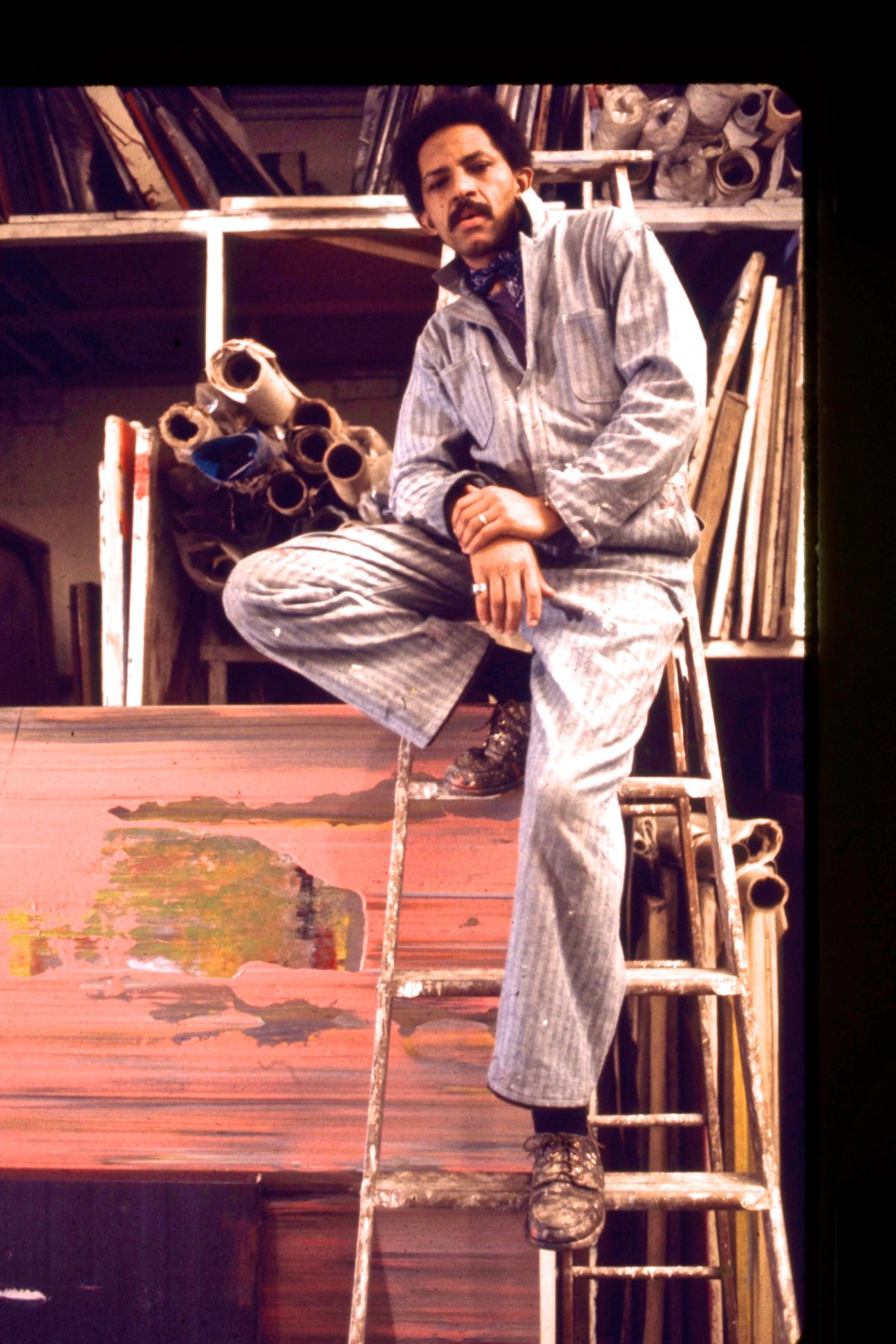 Jack Whitten in the studio with his work Pink Pysche Quee (1973) © Jack Whitten Estate, courtesy the Estate and Hauser & Wirth