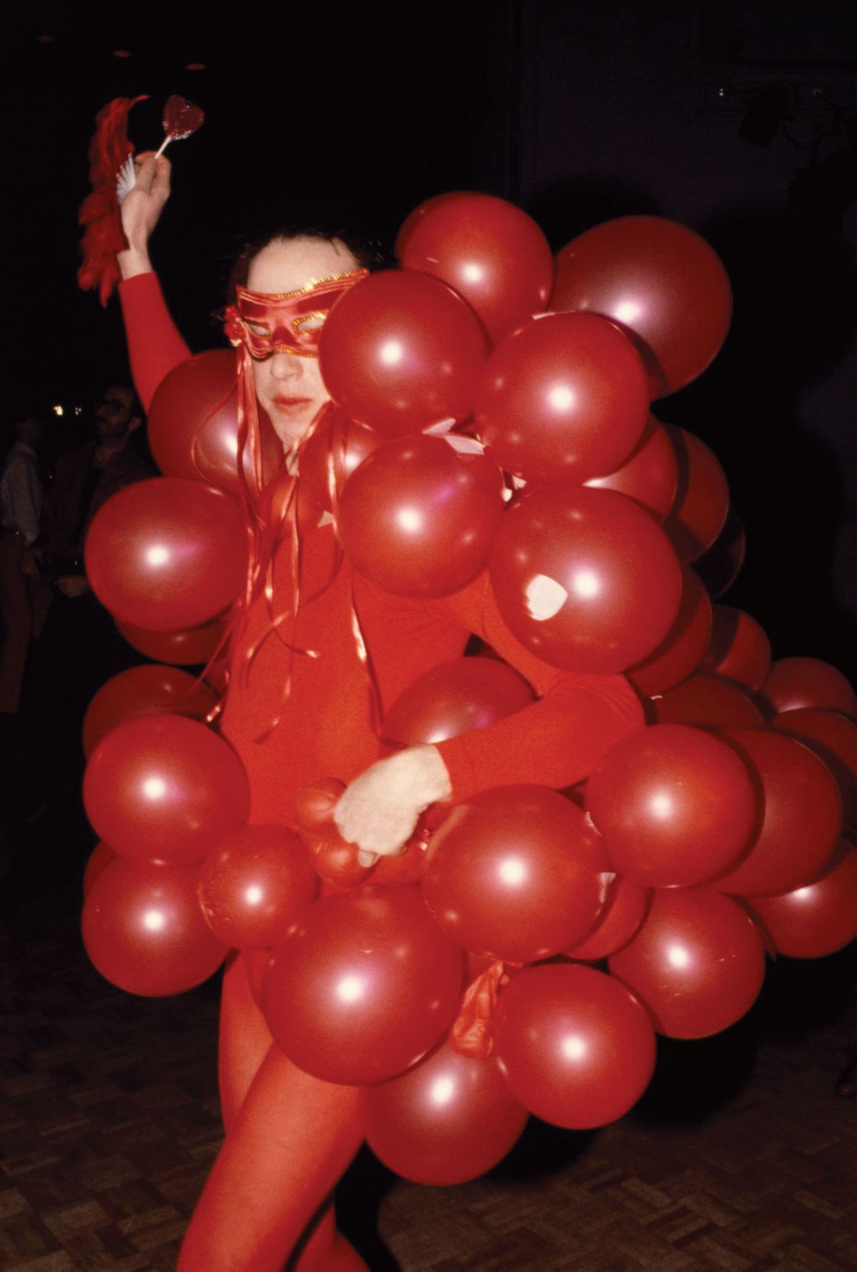 Dustin Pittman, Red Balloons (1979) features a party-goer at Studio 54 Courtesy of the artist. © Dustin Pittman