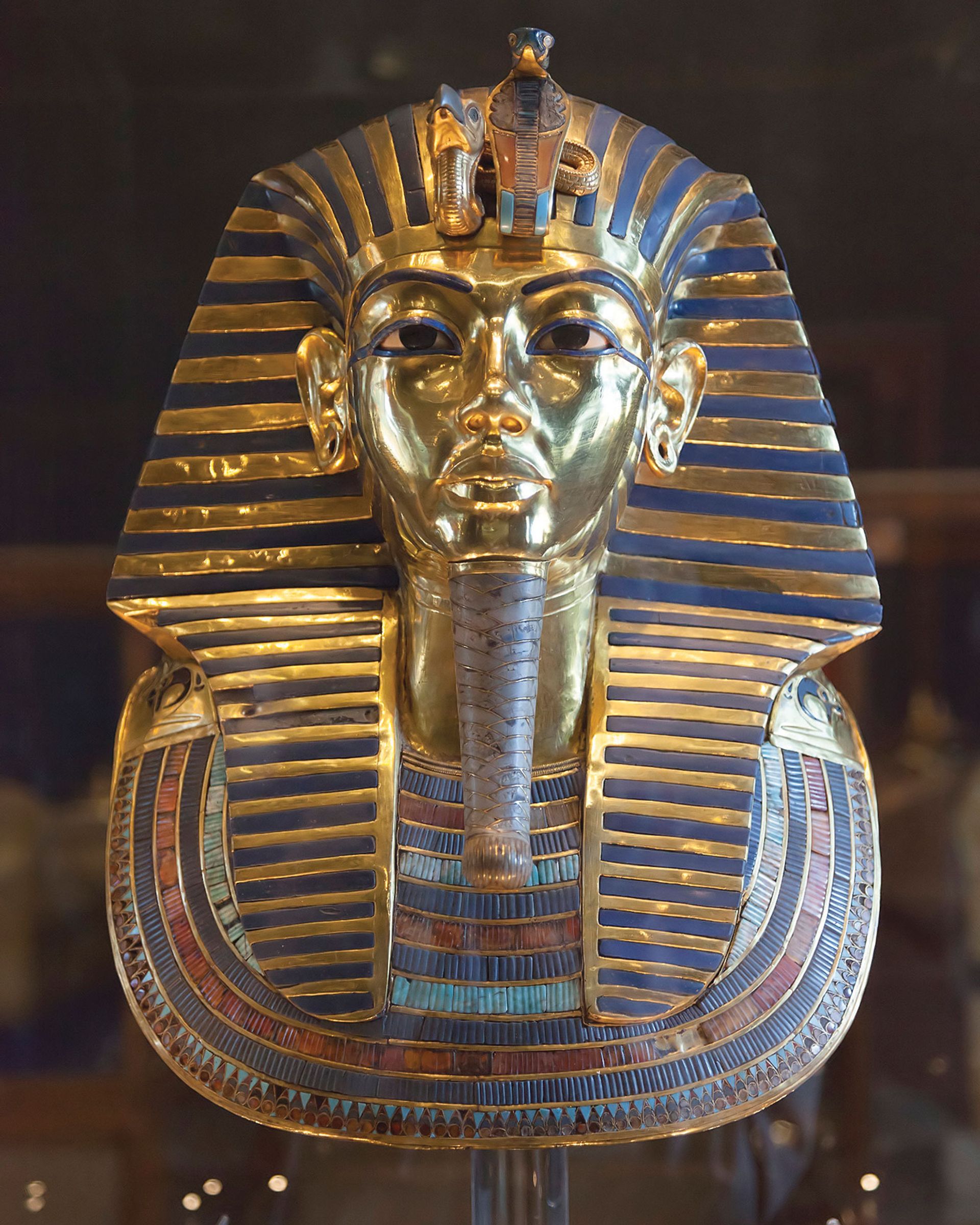 Tutankhamun’s 3,300-year-old mask. Damage to the headdress suggests an ancient accident, when the mummy may have fallen over in a funeral ritual Photo: Roland Unger