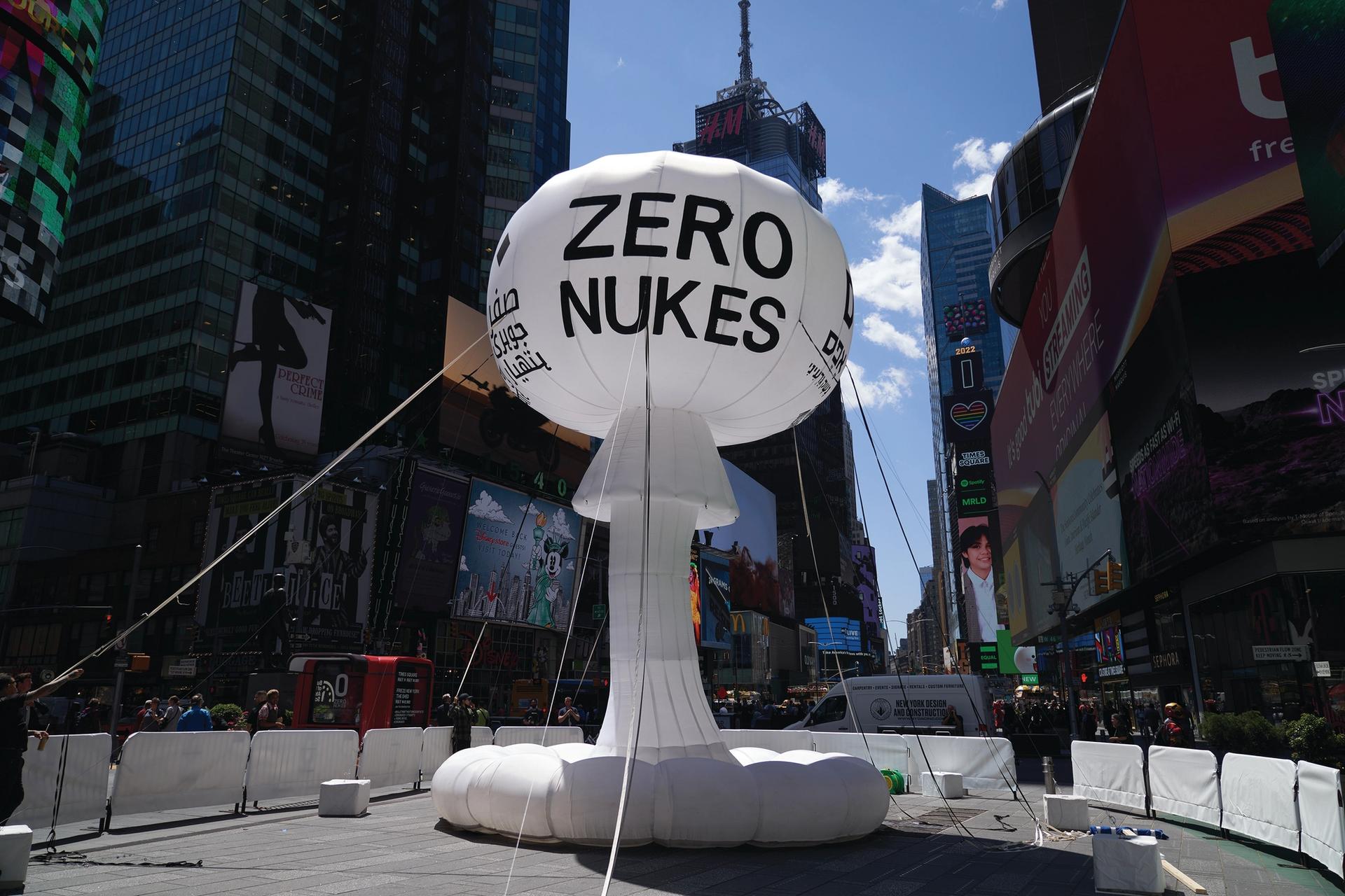 Pedro Reyes's inflatable sculpture ZERO NUKES (2022) in Times Square Photograph by Allison Dinner
