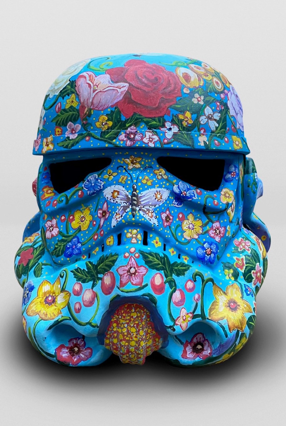 Unskilled Worker's Like Boy Flowers (2019), chalk, pastel, ink, pen and charcoal on a Stormtrooper helmet—Art Wars offered for sale an NFT attached to an image of the work
Courtesy of the artist