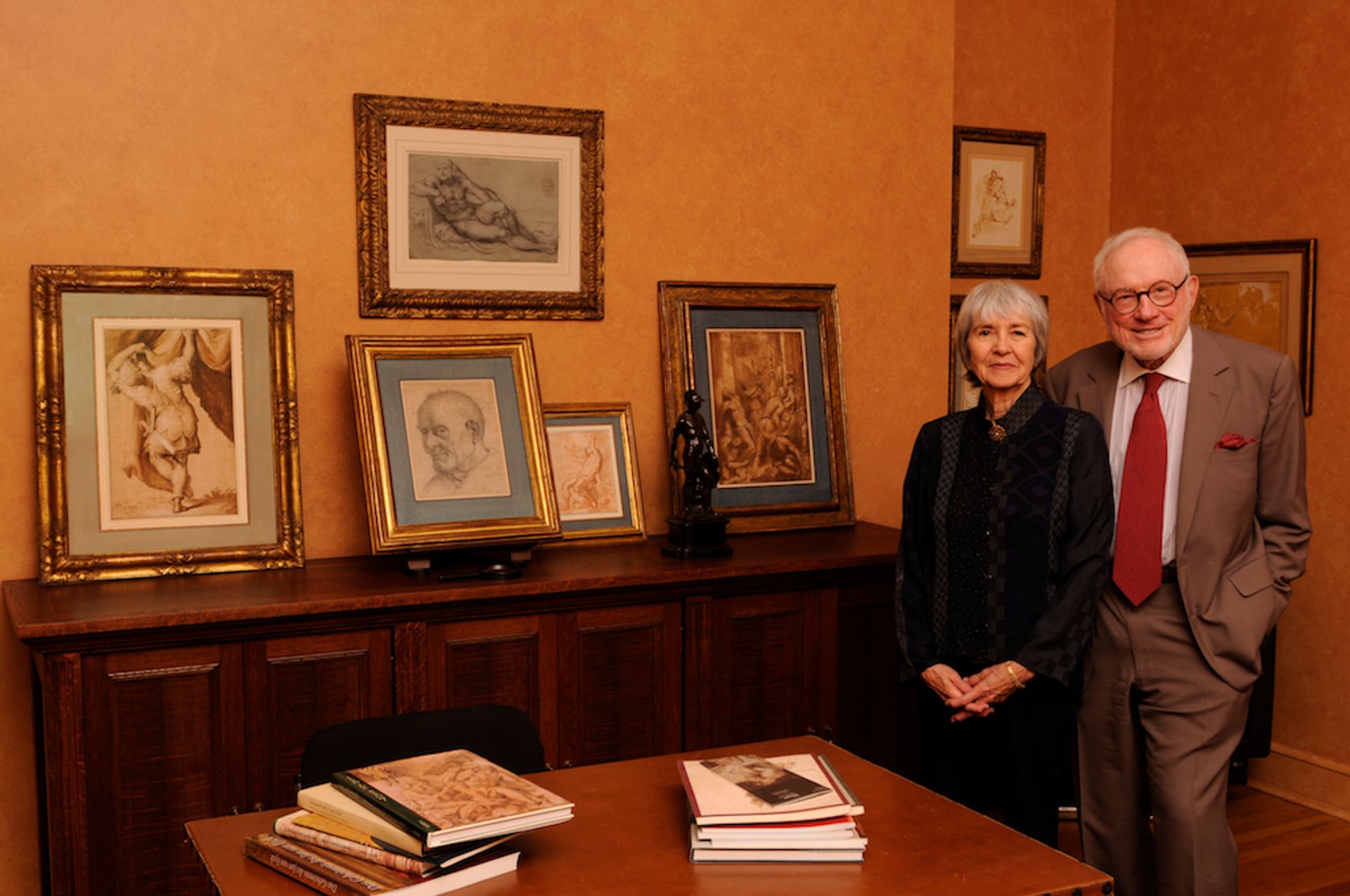 Mary and Richard Gray with drawings from their collection Photo: Dan Dry. Courtesy Richard Gray Gallery