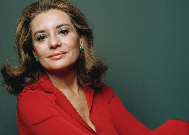 Late Barbara Walters in red suit