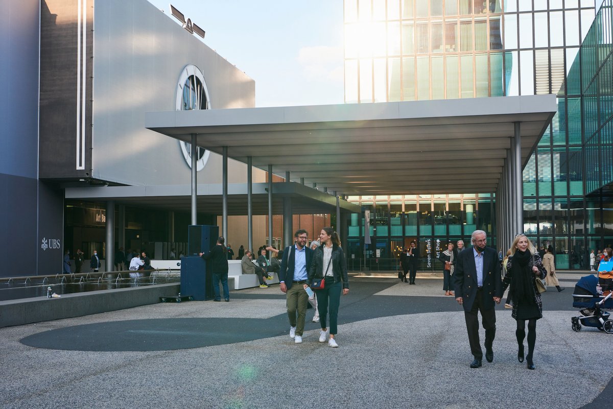 Fairgoers on the Messeplatz in Basel, Switzerland. © Art Basel