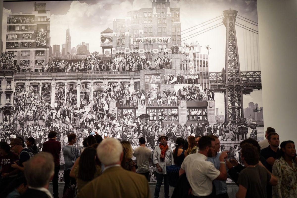 Visitors attend the opening of JR: Chronicles at the Brooklyn Museum on 2 October 2019 Photo: Gonzalo Marroquin/PMC