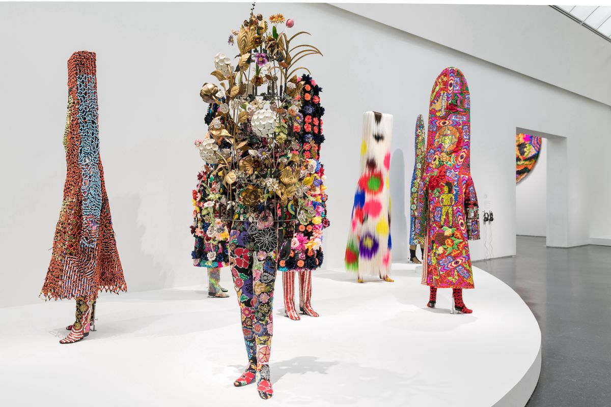 Installation view, Nick Cave: Forothermore, MCA Chicago, 2022. Soundsuit, in foreground, by Nick Cave is a part of the Marilyn and Larry Fields gift Photo: Nathan Keay, © MCA Chicago