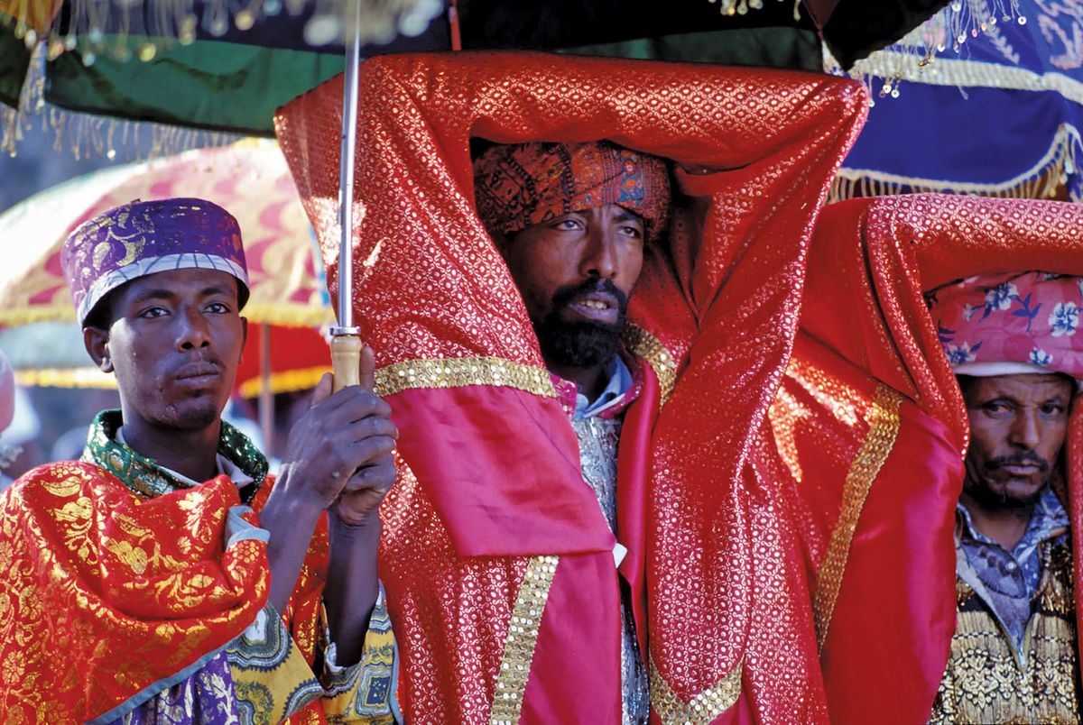 An Orthodox priest carries a covered tabot—a sacred object—in a ceremony in Gondar, Ethiopia Jialiang Gao