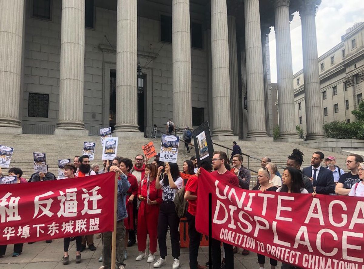 Local business owners and activists were joined by artists and gallery owners for a press conference on the steps of a Manhattan court house before the hearing Photo: Caitlin Kelmar