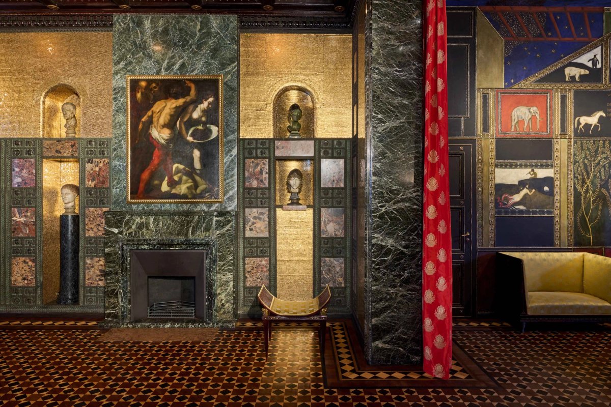 The restored reception salon, left, adjoins the music salon
Photo: Jann Averwerser