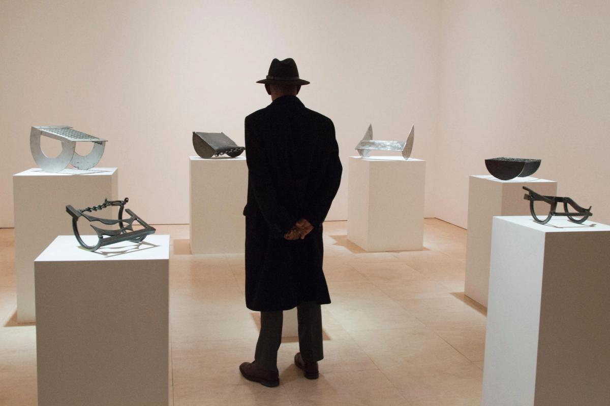 A visitor at the Melvin Edwards solo exhibition at Stephen Friedman’s London space, in 2024
Photo: ukartpics