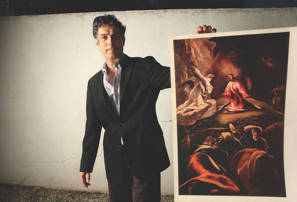David de Csepel, the great grandson of Baron Herzog, with a photocopy of The Agony in the Garden by El Greco, formerly part of Baron Herzog’s art collection Photo: Mel Melcon/Los Angeles Times via Getty Images