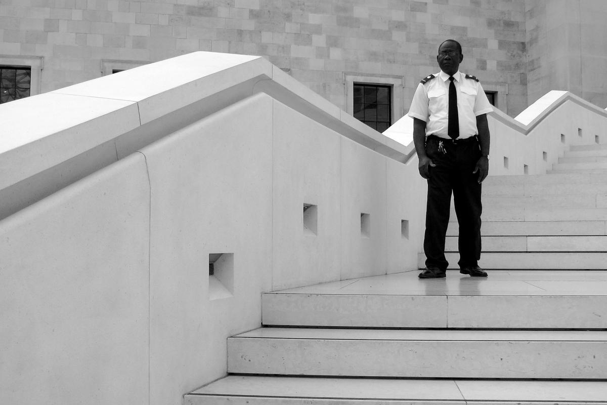 A security guard keeps watch over the British Museum in London Photo: CGP Grey
