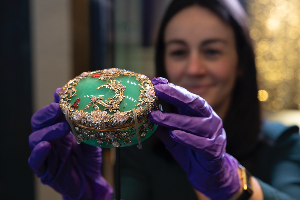 Alice Minter, Senior Curator of the Rosalinde and Arther Gilbert Collection, installing the chrysoprase snuff box in the new Gilbert Galleries
Photo: V&A