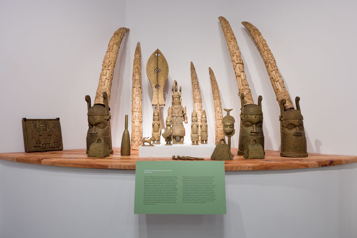 The Fowler objects featured here are part of a wood model of the royal altar for Oba Ovonramwen commissioned in 1921 by his son Eweka II after his father’s death in exile in 1914. The original burned in 1923, making this 1924 replica carved by royal guild artists in Benin an important piece of the historical record. Courtesy of the Fowler Museum