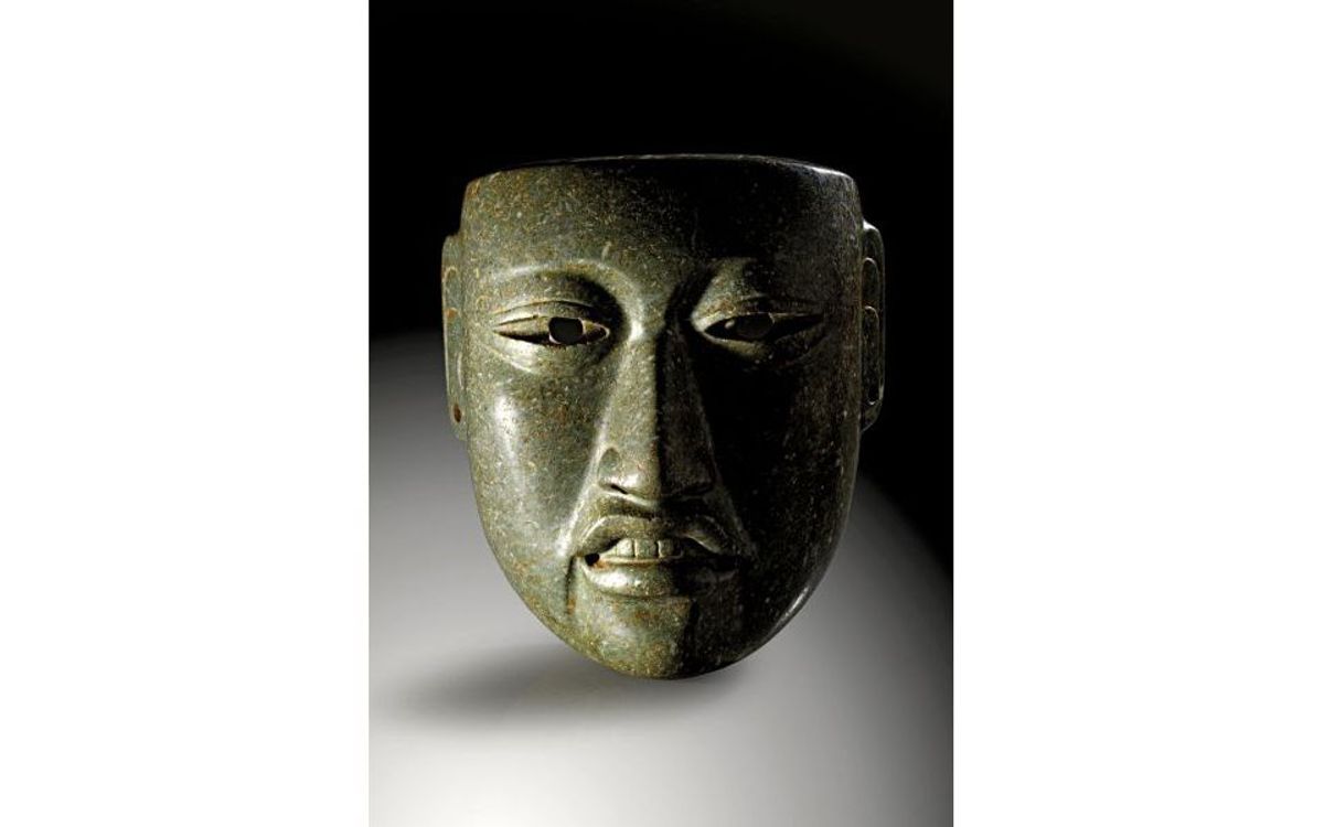 A green nephrite Olmec mask of a dignitary, around 1500-600 BC, offered for sale at Gerhard Hirsch Nachfolger, did not reach its reserve price