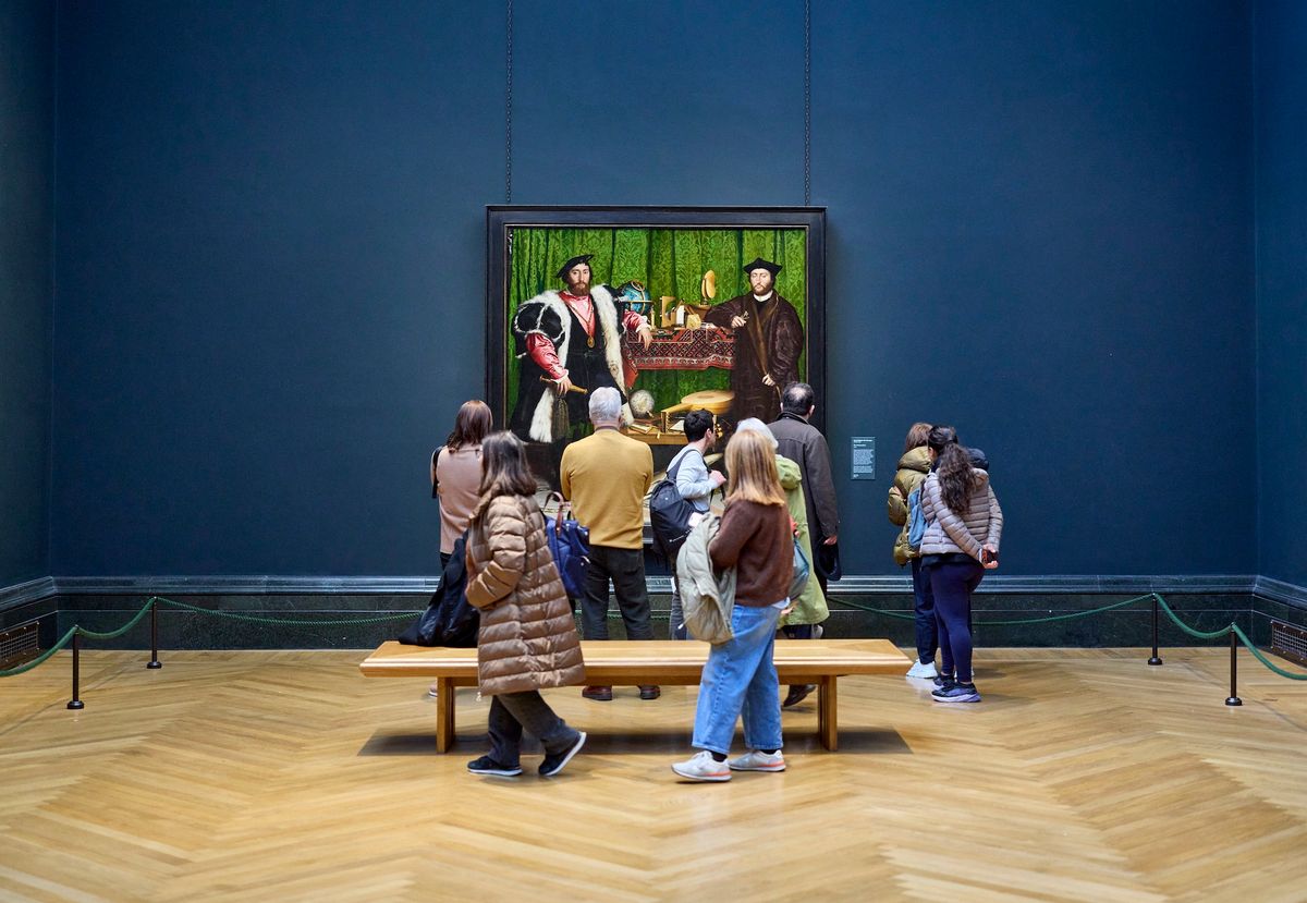 Visitors to the National Gallery in London take in one of its treasures, Hans Holbein the Younger's The Ambassadors (1533) Photo: © David Levene; Art Fund 2026