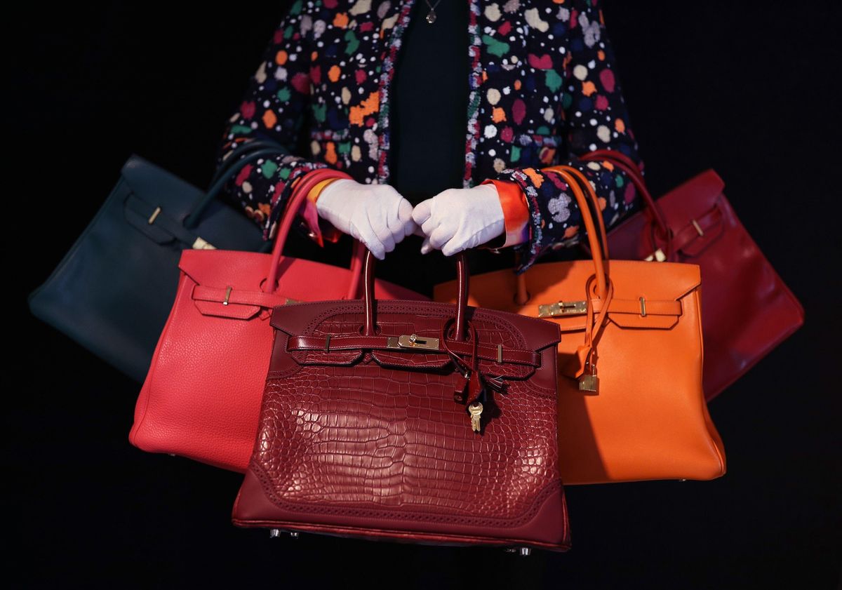Hermès Birkin bags on display during a preview of Bonhams's designer handbags and fashion sale in London in October 2020 Yui Mok / PA Images / Alamy Stock Photo
