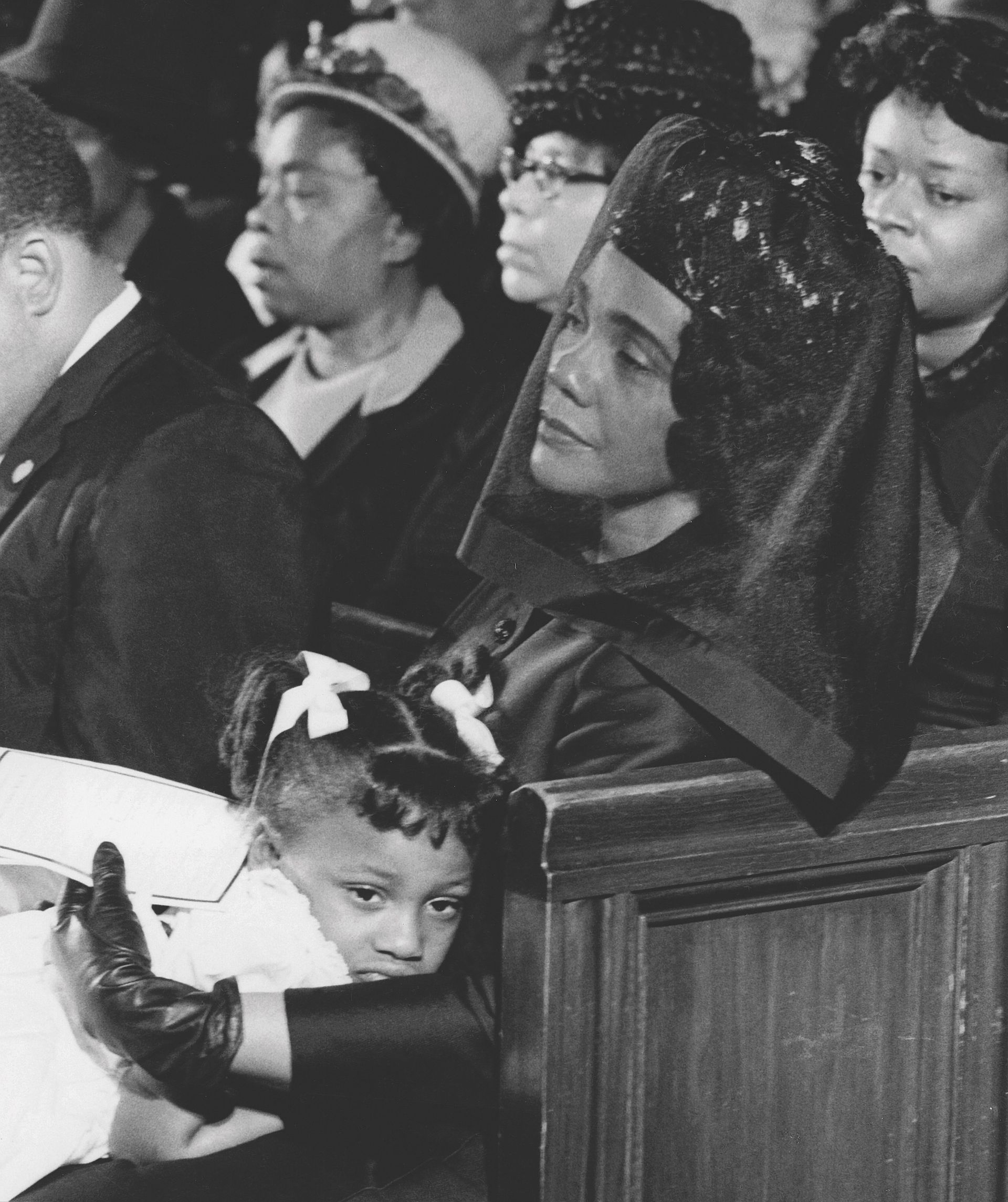 Pulitzer Prize-winning photograph by Moneta Sleet Jr. of Coretta Scott King consoling her daughter, Bernice, at the funeral of Dr. Martin Luther King Jr. in April 1968. Moneta Sleet Jr. /Ebony Collection. Johnson Publishing Company Archive. Courtesy Ford Foundation, J. Paul Getty Trust, John D. and Catherine T. MacArthur Foundation, Andrew W. Mellon Foundation, and Smithsonian Institution