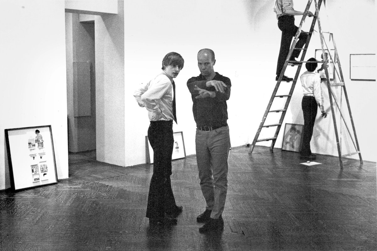 Michael Findlay, the author of Portrait of the Art Dealer as a Young Man, with Ray Johnson installing an exhibition in 1968 © Estate of William S. Wilson
