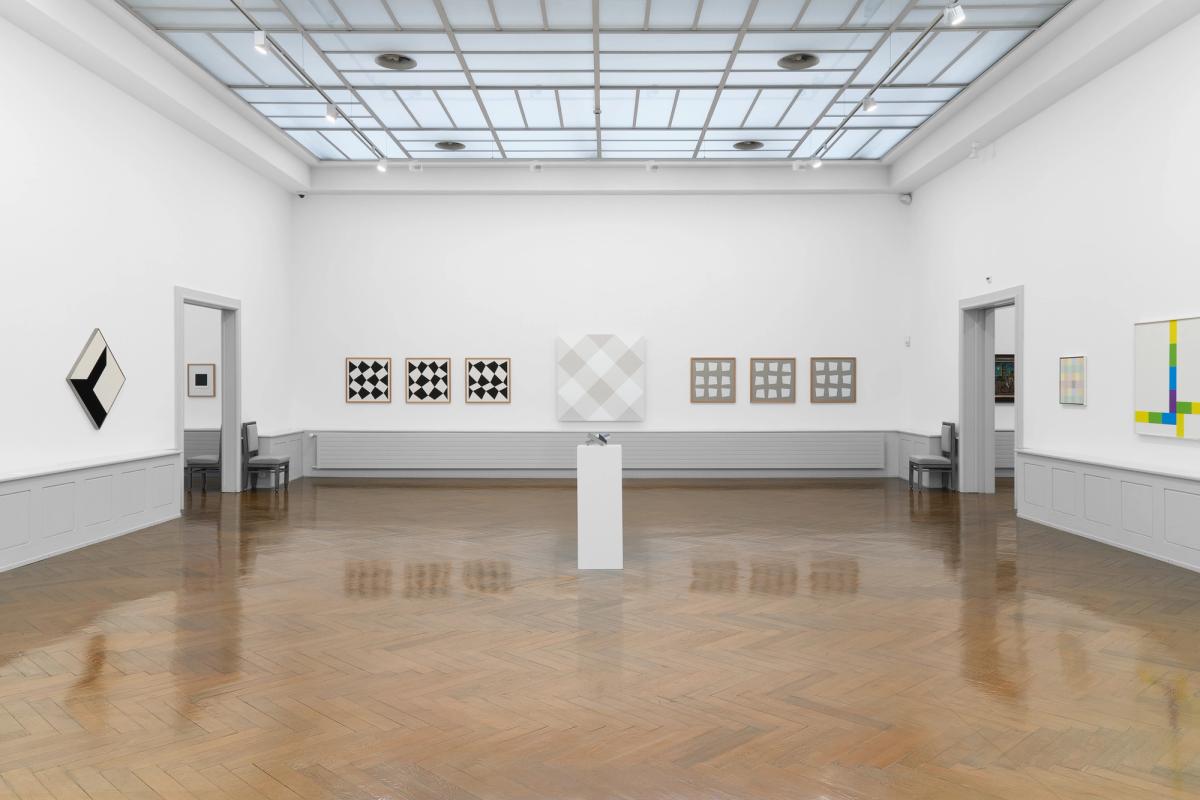 An installation view of Voyages en zigzag. La collection de Philippe Bodenmann at Musée des beaux-arts La Chaux-de-Fonds, with Andreas Christen’s untitled monochrome relief (1998) in the centre Photo: Gaspard Gigon
