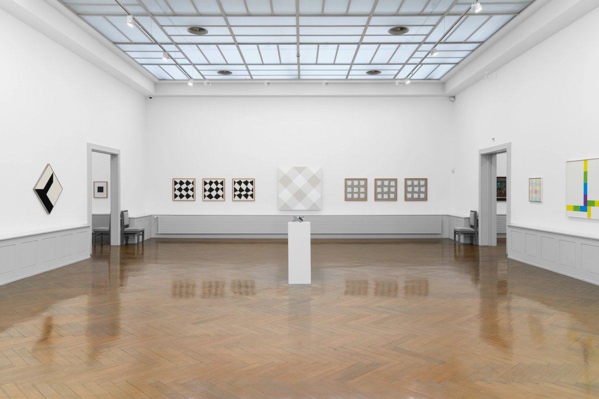An installation view of Voyages en zigzag. La collection de Philippe Bodenmann at Musée des beaux-arts La Chaux-de-Fonds, with Andreas Christen’s untitled monochrome relief (1998) in the centre Photo: Gaspard Gigon