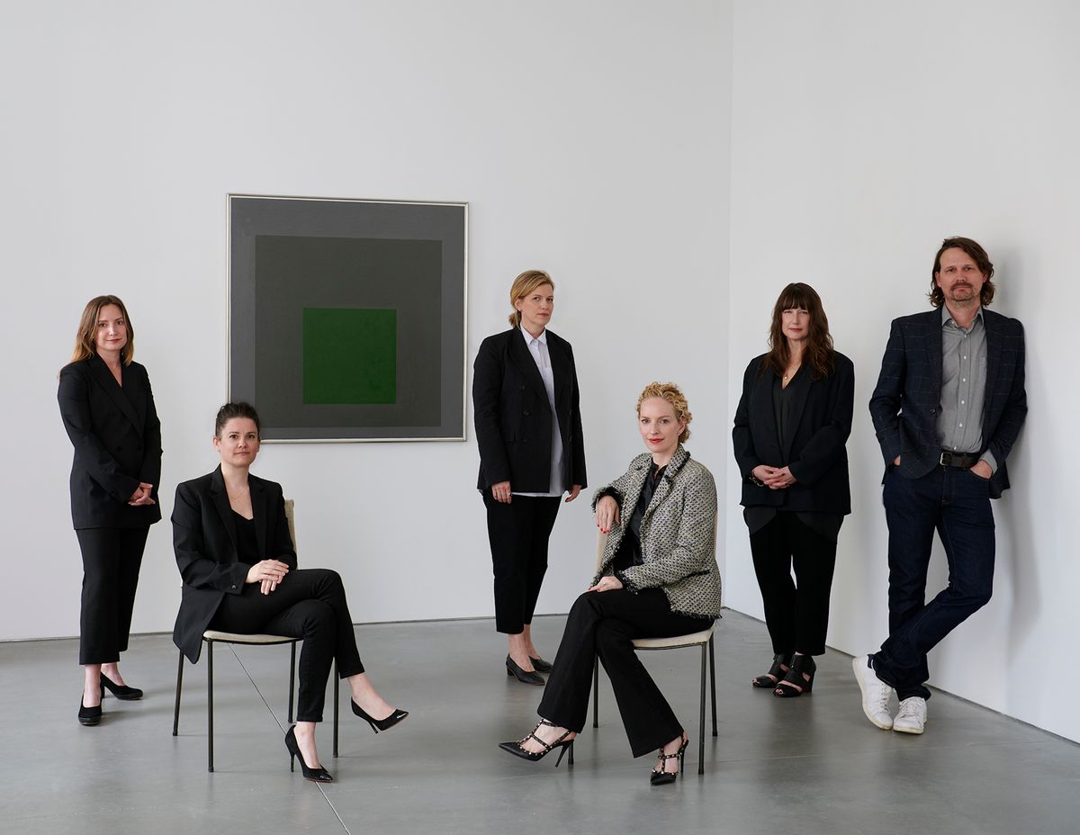 David Zwirner's secondary market department (from left to right): Katherine Lukacher, the gallery’s director of secondary market online sales; Meghan Hill, the gallery’s senior director of sales; Alexandra Whitney, who heads the gallery’s global research department; Kristine Bell, a senior partner who leads the department; Kelly Reynolds, the gallery's senior director of operations, exhibitions and registration; and Cy Amundson, director of art handling. Artwork: Josef Albers, Homage to the Square: Embedded, 1963 Artwork: © The Josef and Anni Albers Foundation / Artists Rights Society (ARS), New York. Courtesy The Josef and Anni Albers Foundation and David Zwirner. Photo: Jason Schmidt