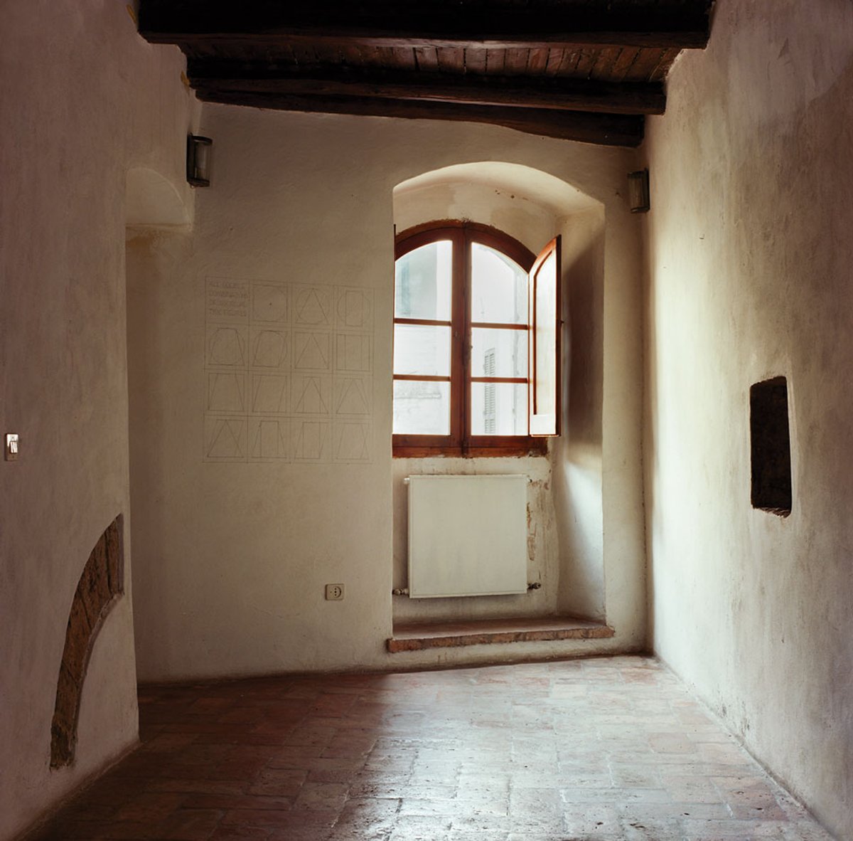 The interior of the Vecchia Torre in Spoleto with Sol LeWitt's wall drawings Photo: Joschi Herczeg
