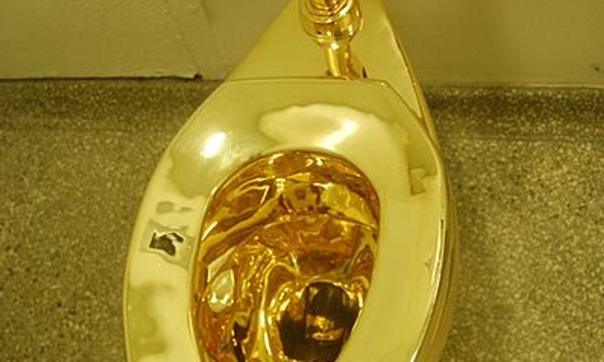 Two men jailed for Cattelan gold toilet theft
